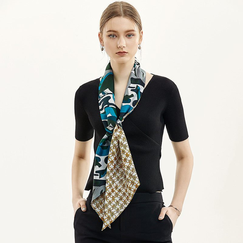 Women's abstract print long silk scarf displayed flat