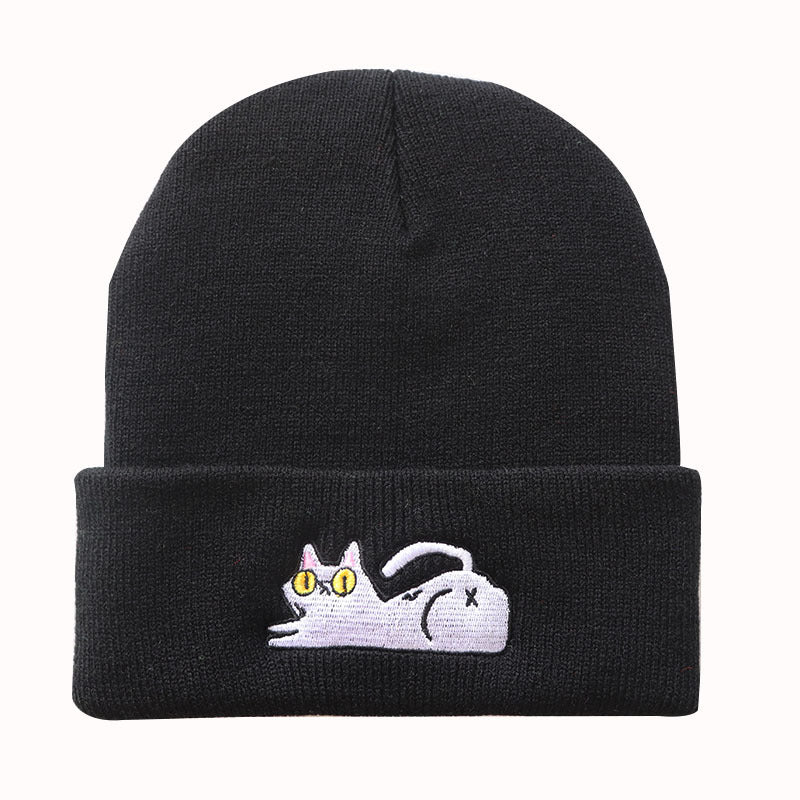 Black cuffed beanie with playful lazy cat embroidery