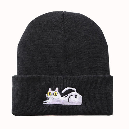 Black cuffed beanie with playful lazy cat embroidery