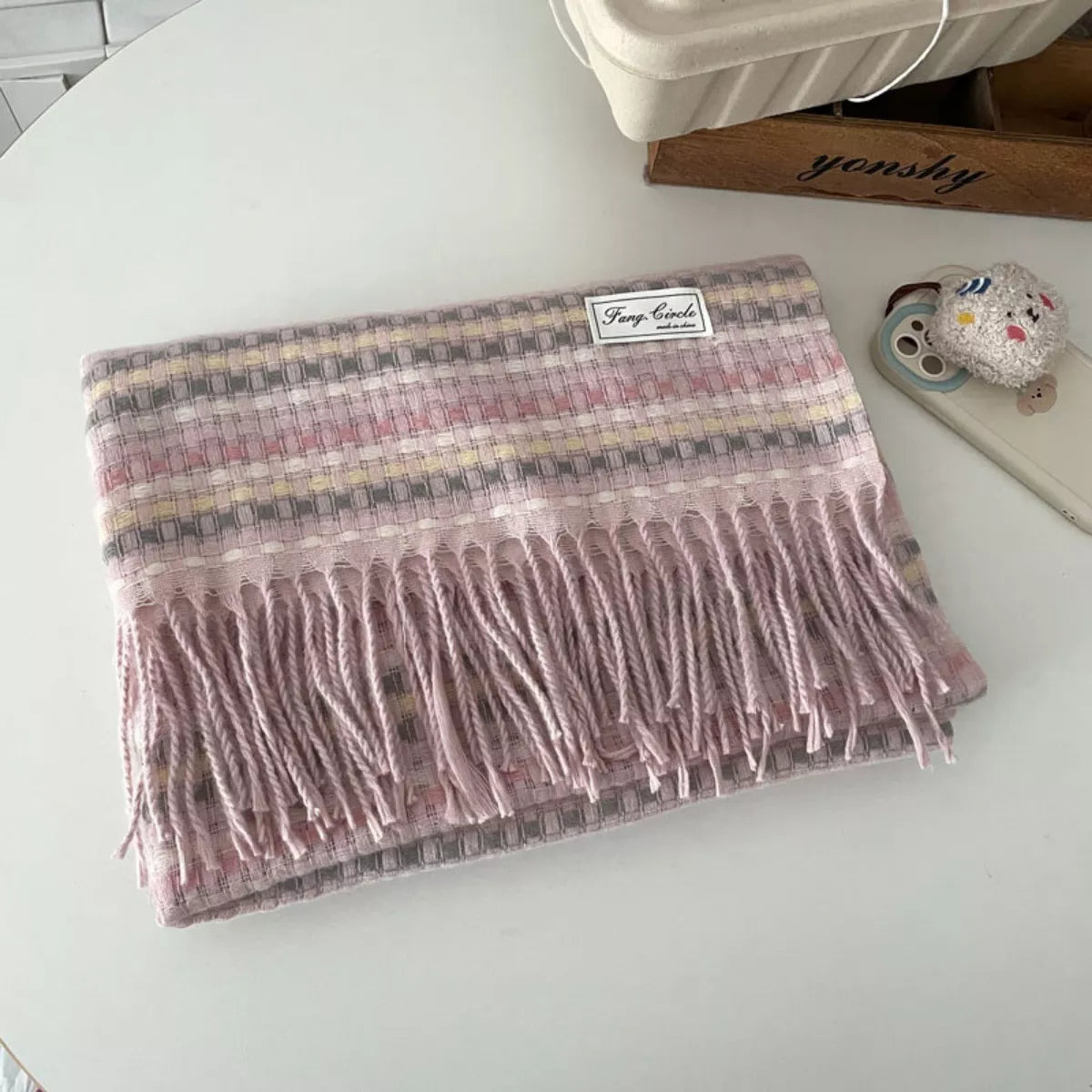 Unisex Soft Patterned Fringe Scarf — pink scarf folded on a pale surface