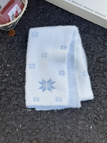 Unisex Snowflake Plush Knit Scarf — folded scarf showing blue snowflakes and edge trim