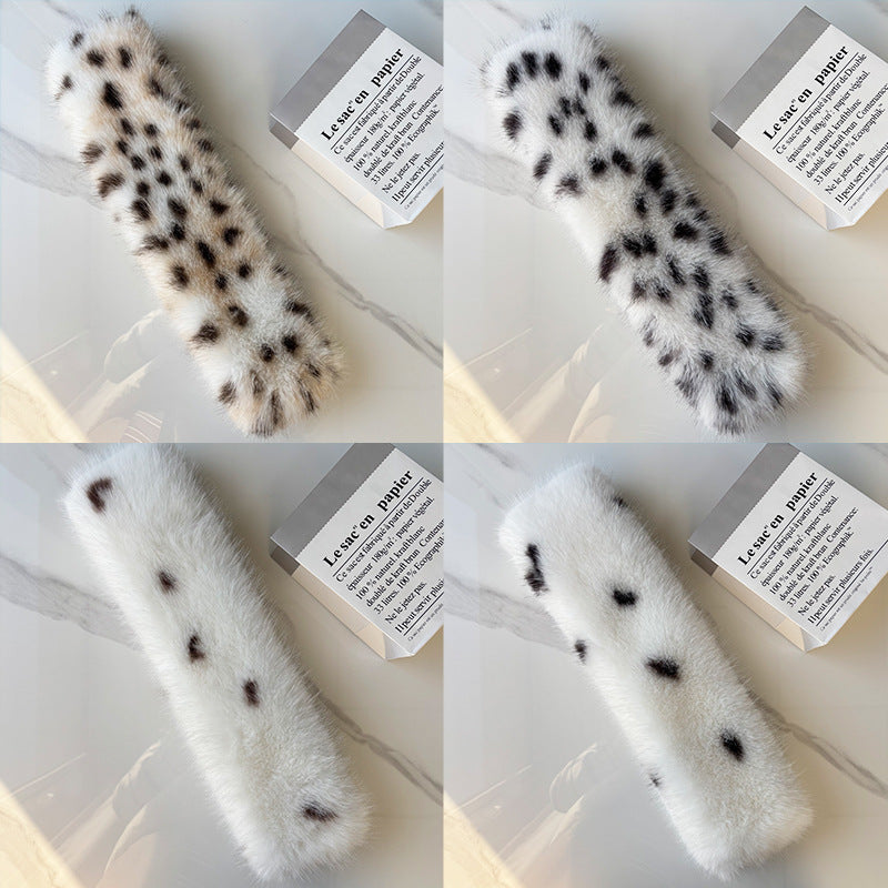 Leopard and spotted scarves shown laid flat and crossed
