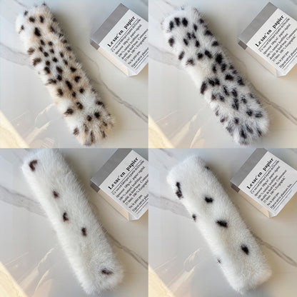 Leopard and spotted scarves shown laid flat and crossed