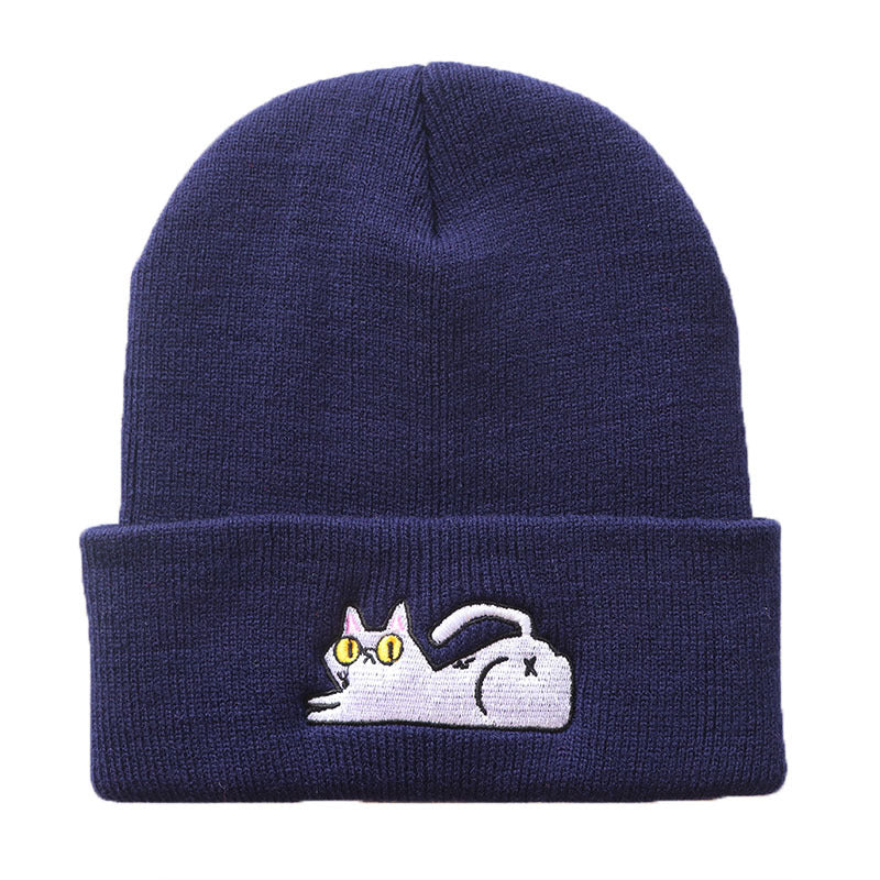 Navy blue lazy cat beanie shown from the front