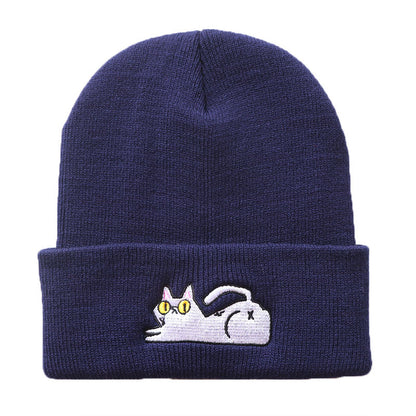 Navy blue lazy cat beanie shown from the front