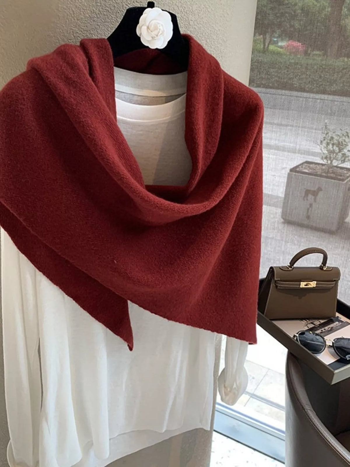 Women's Red Wool Triangle Shawl — red wrap loosely arranged at the neckline