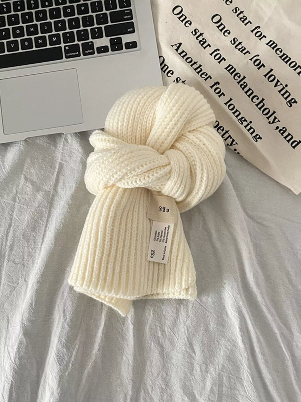 Unisex Compact Ribbed Knit Scarf — milky white scarf showing deep rib lines