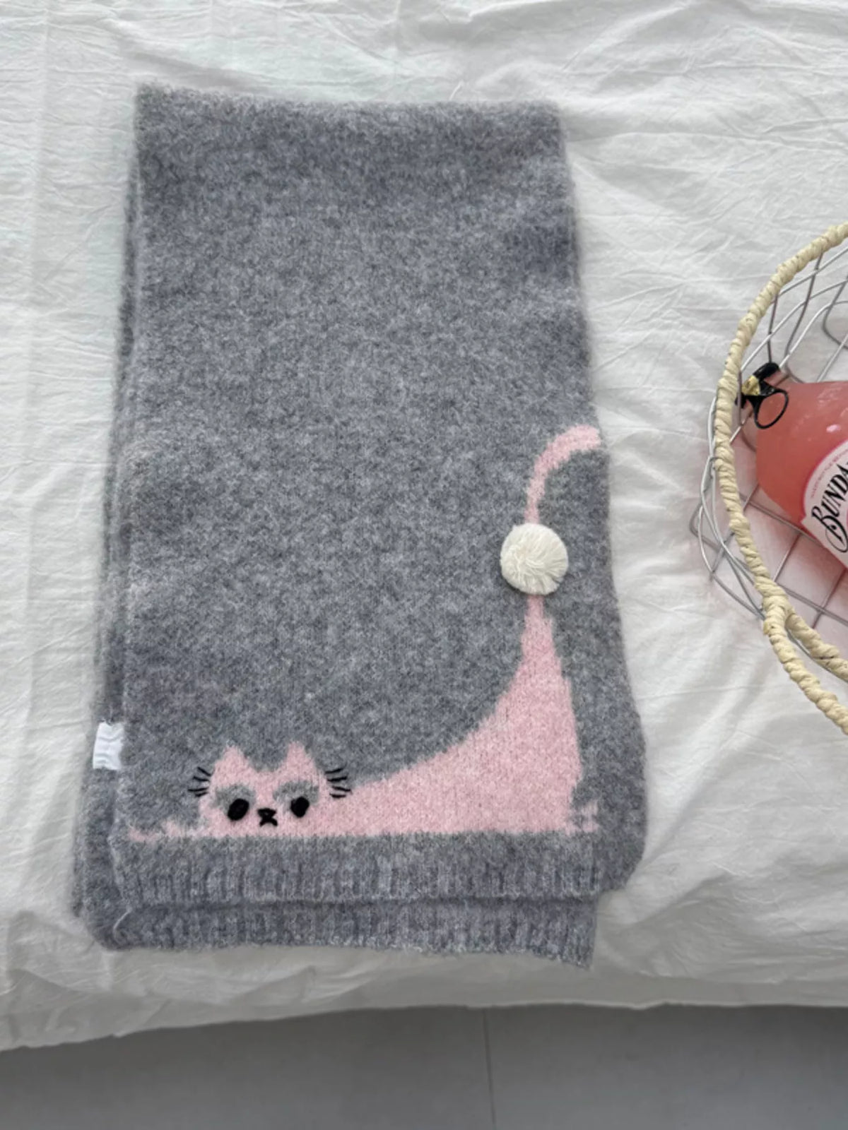 Unisex Playful Cat Knit Scarf — gray scarf showing the long-tailed cat illustration
