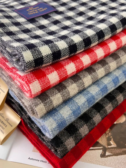 Unisex 100% Wool Plaid Scarf — stack of wool plaid scarves showing contrasting checks