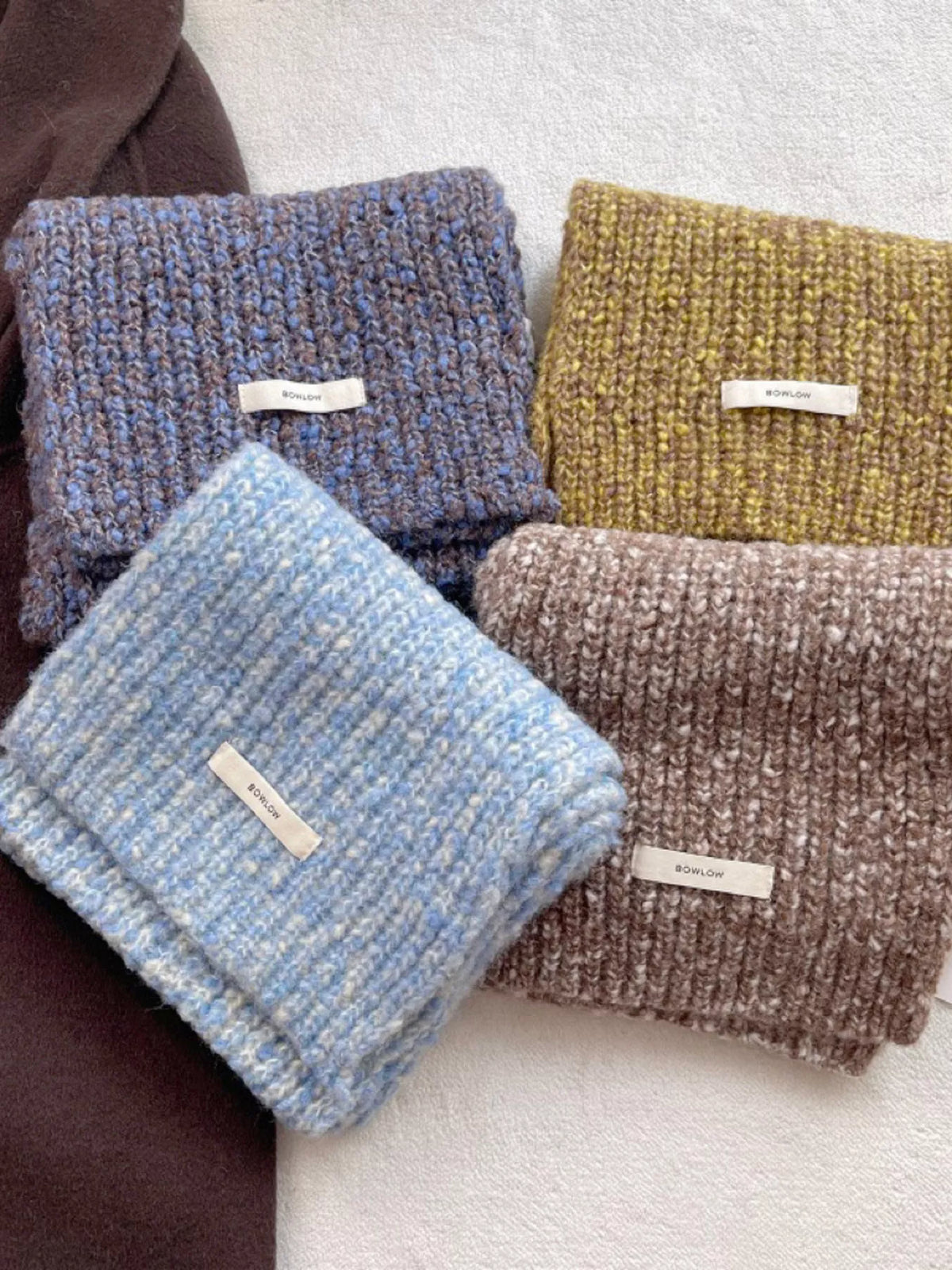 Unisex Cozy Knitted Winter Scarf — 47.2-Inch — blue and muted brown scarves arranged in a group