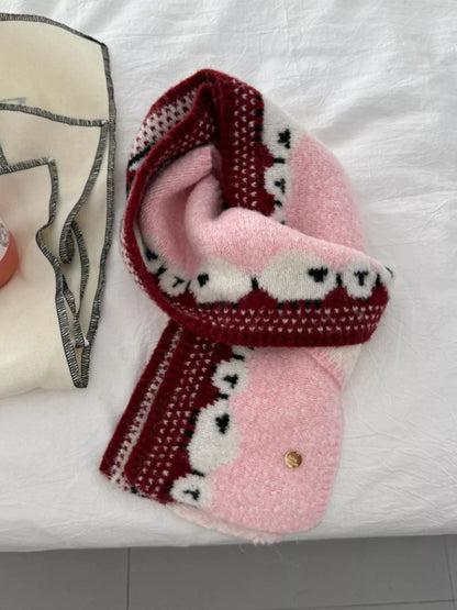 Unisex Sheep Motif Knit Scarf — pink sheep scarf looped to show a dark contrast band