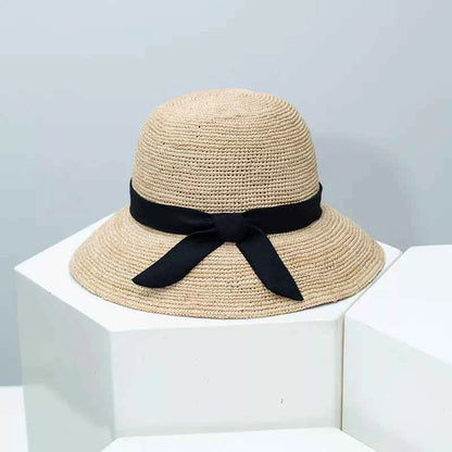 Brown woven straw sun hat ribbon detail