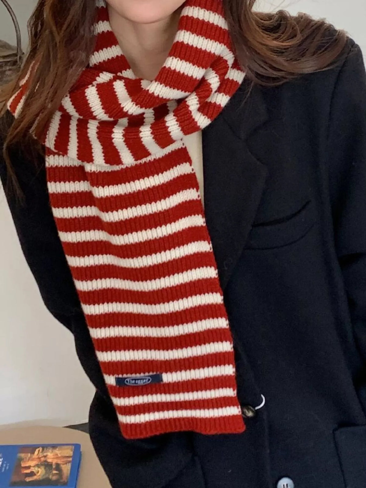 Unisex 100% Wool Striped Knitted Winter Scarf — red striped scarf worn with a dark coat