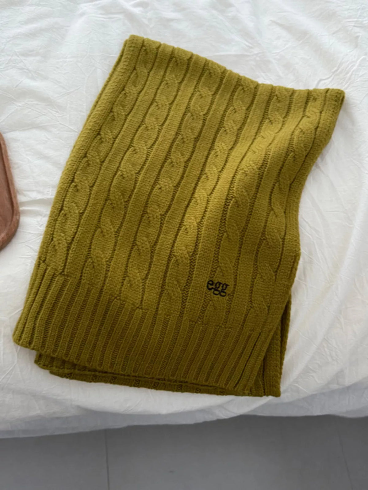 Unisex Cable Rib Winter Scarf — folded green scarf with vertical knitted detail
