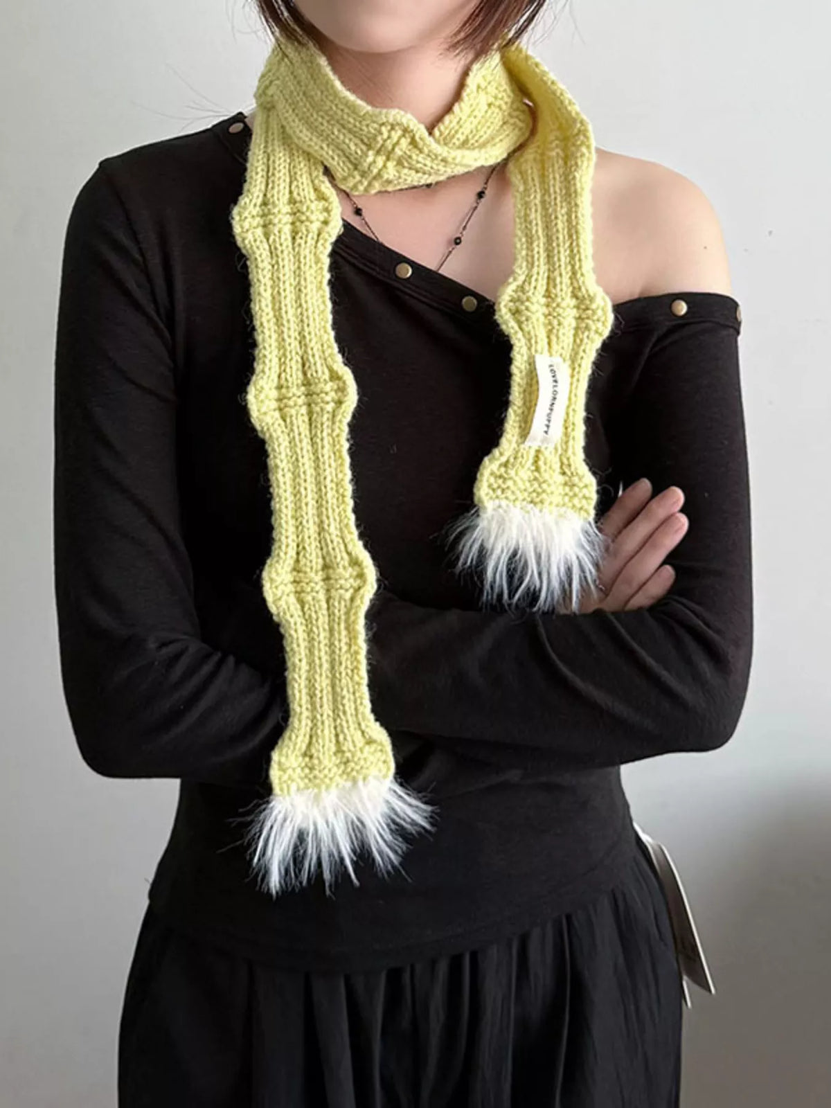 Unisex Plush-Tip Skinny Knit Scarf — yellow narrow scarf worn as a loose front tie