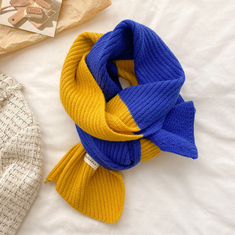 Unisex Two-Tone Ribbed Knit Winter Scarf — blue and yellow ribbed scarf arranged in a loose knot