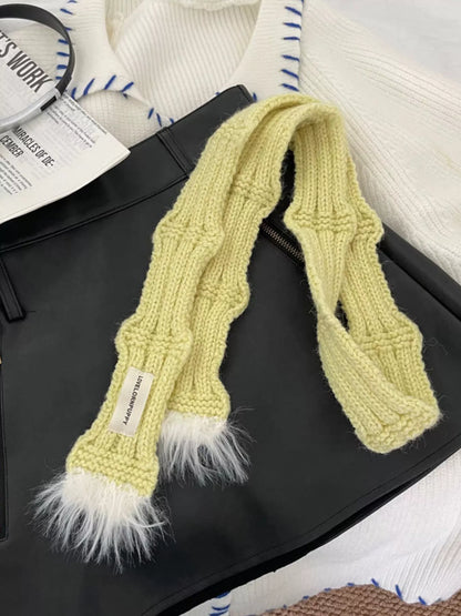 Unisex Plush-Tip Skinny Knit Scarf — yellow scarf laid flat showing narrow knitted sections