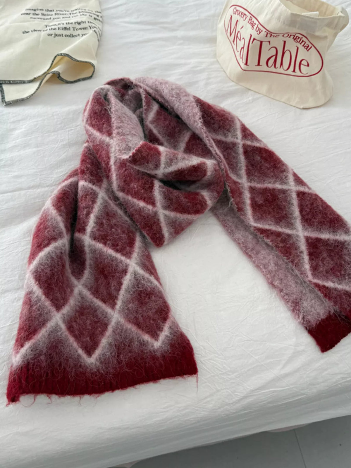 Unisex Diamond Grid Fuzzy Scarf — red diamond scarf looped beside the dark version