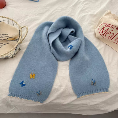Unisex Butterfly Embroidered Scarf — blue scarf arranged in a circular knot