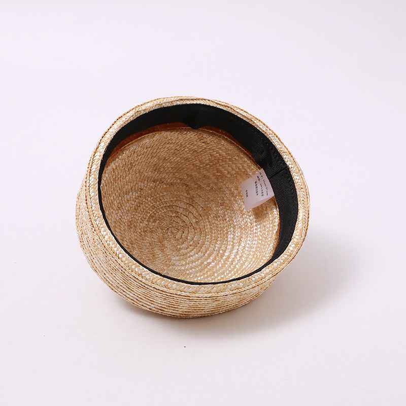 Breathable raffia-style docker cap texture close-up