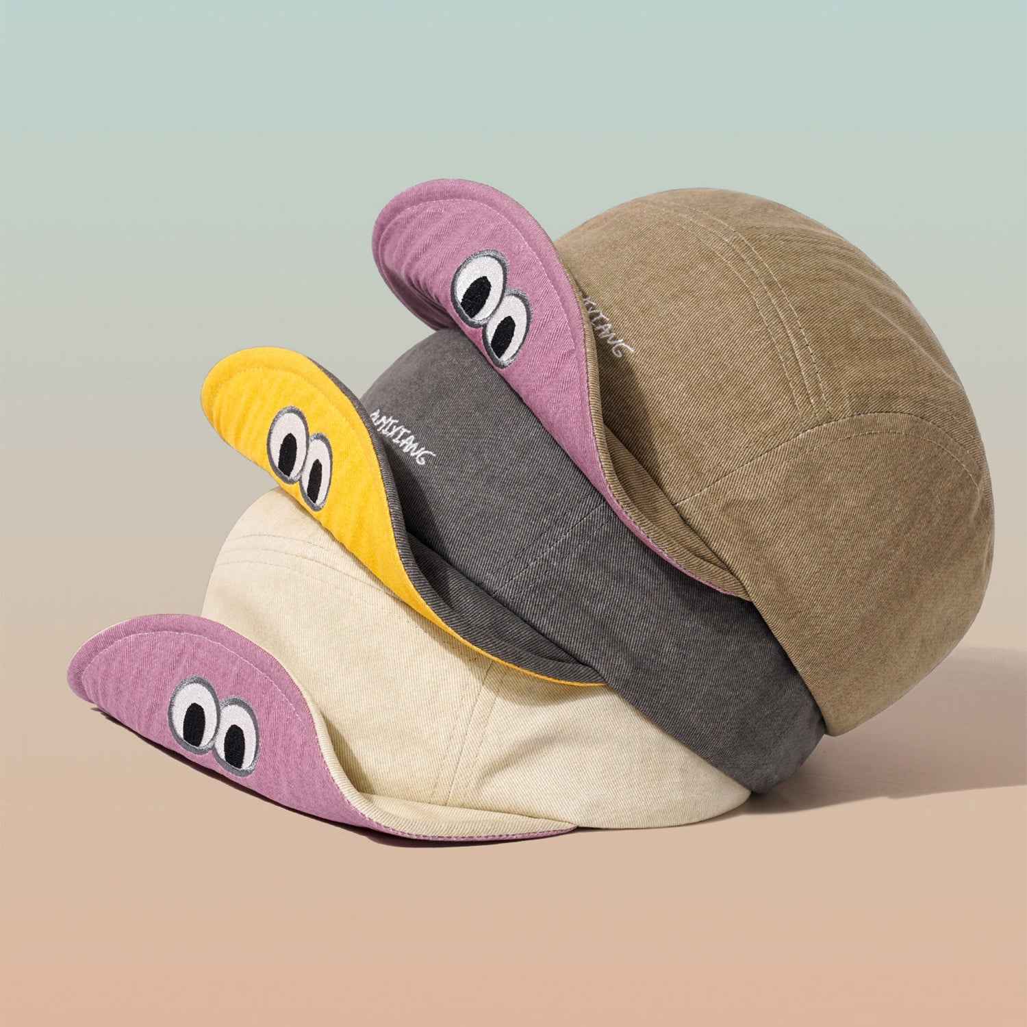 Dark blue cartoon eyes flat cap side profile