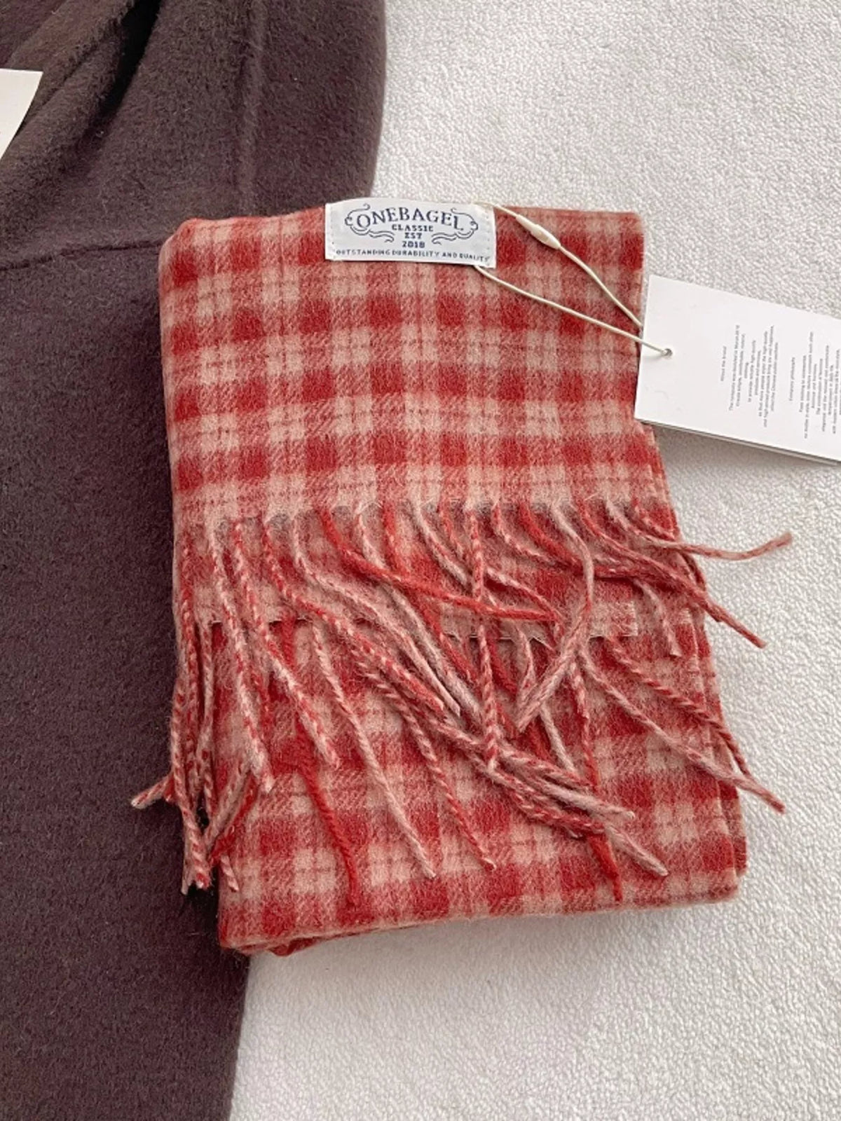 Unisex Fine Plaid Wool Fringe Scarf — folded red wool scarf showing its small check pattern