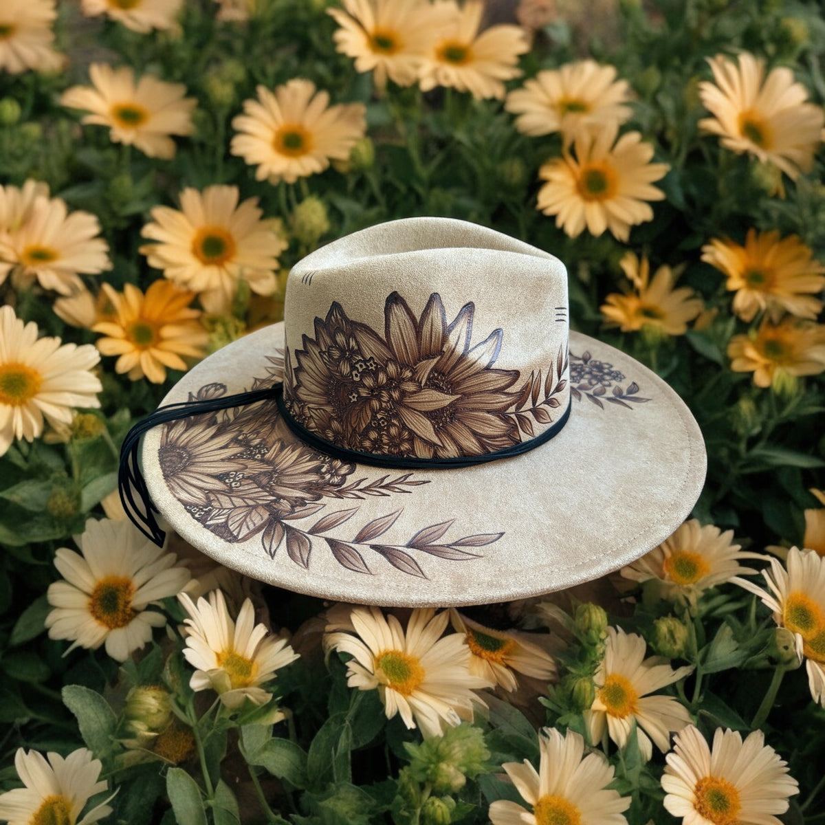 Angled view of the Whiteleaf hat showing the floral crown and decorated brim