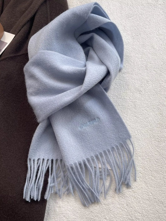 Unisex Azure Wool Fringe Scarf — azure blue wool scarf loosely looped with fringe visible