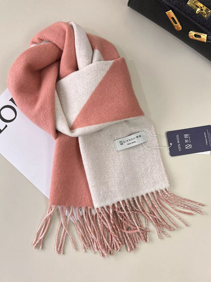 Unisex Fringe Color Block Scarf — pink and beige wool scarf looped on a pale surface