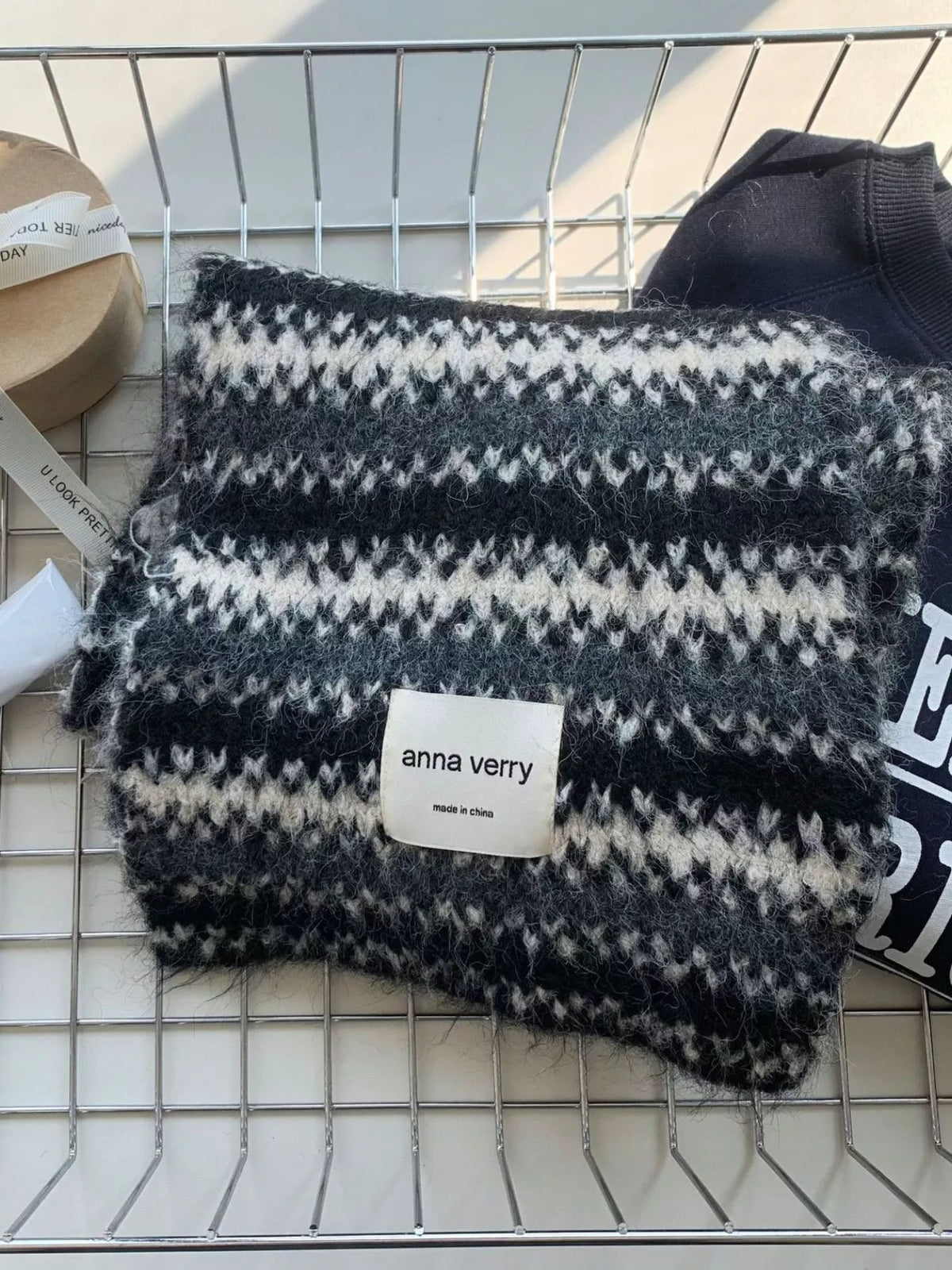 Unisex Striped Knitted Warm Scarf — folded gray striped scarf showing fuzzy knit surface