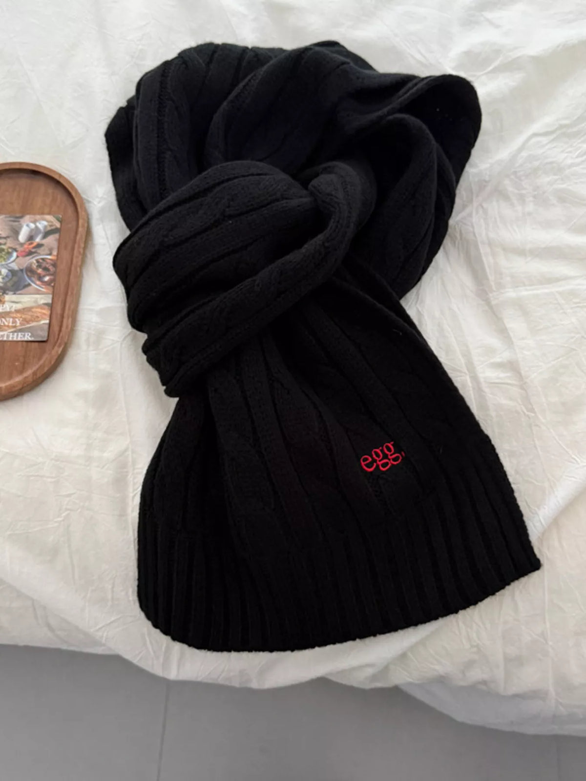 Unisex Cable Rib Winter Scarf — black cable rib scarf loosely knotted