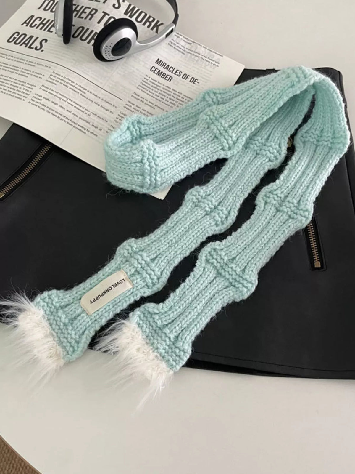 Unisex Plush-Tip Skinny Knit Scarf — mint narrow scarf displayed with its long knitted body
