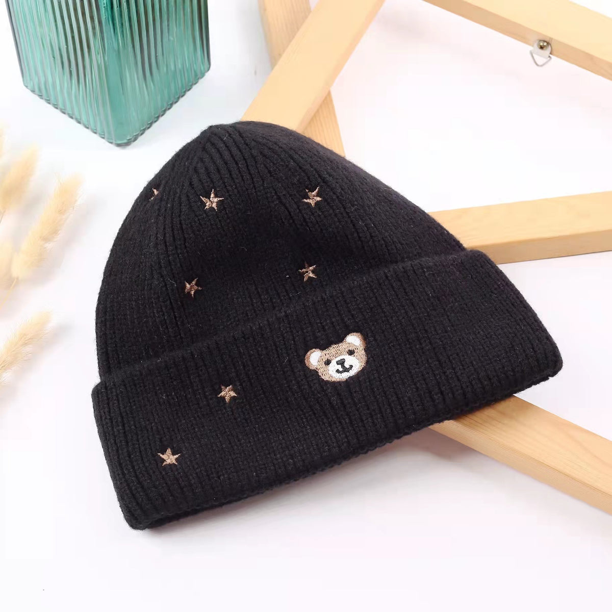 Black teddy bear beanie with a folded ribbed cuff