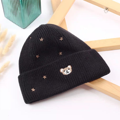 Black teddy bear beanie with a folded ribbed cuff