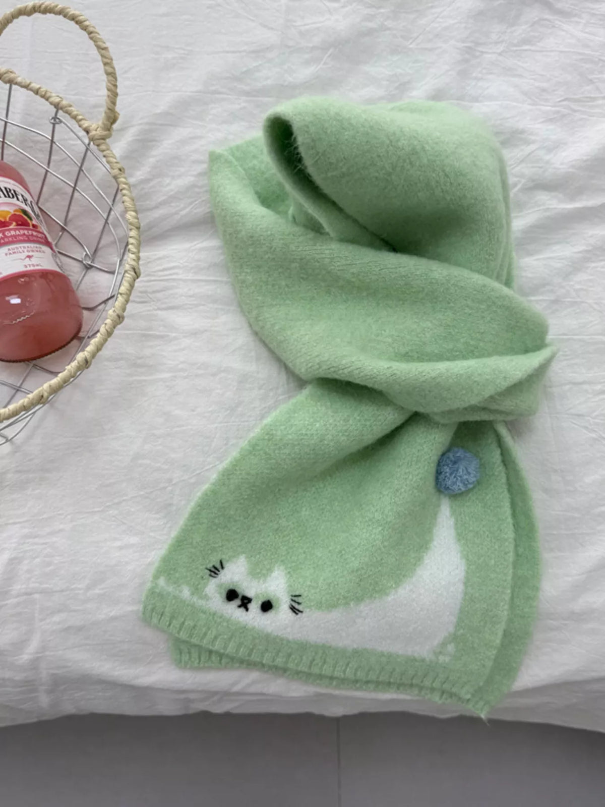 Unisex Playful Cat Knit Scarf — green cat motif scarf loosely tied