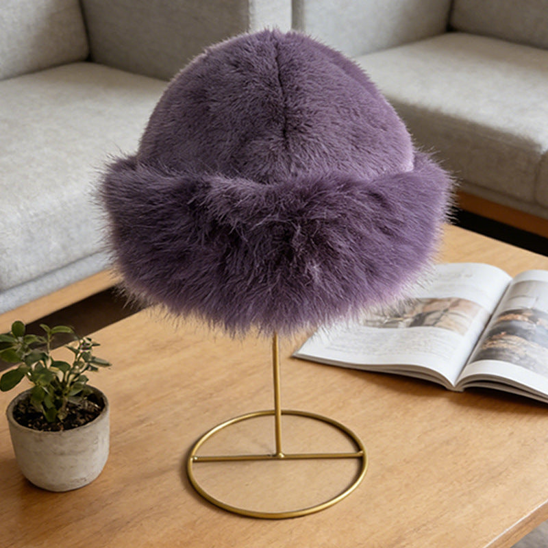 Purple faux fur winter hat with a plush rolled edge