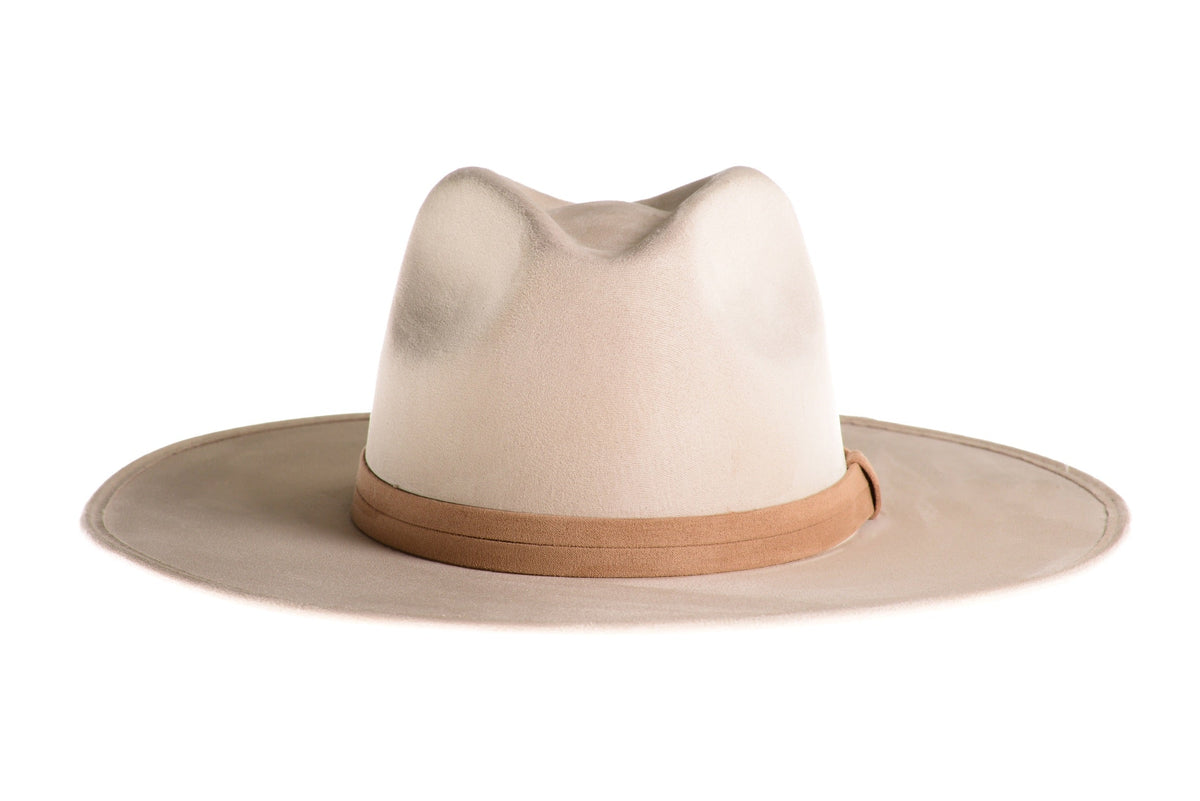 Three-quarter front view of ASN Hats Blanco cream fedora with a tan band