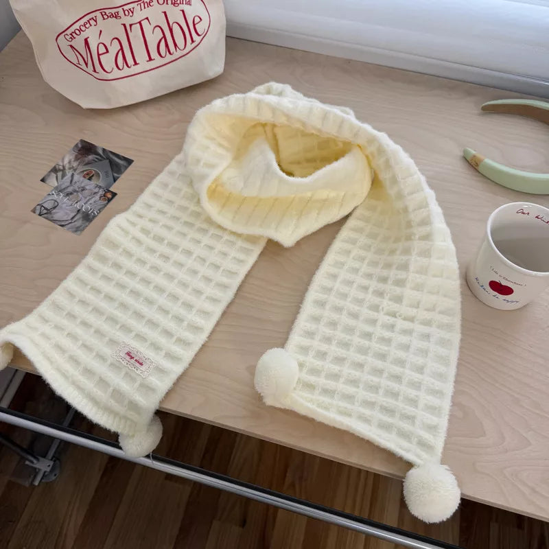 Unisex Waffle Knit Pom-Pom Scarf — milky white waffle scarf arranged in a long loop