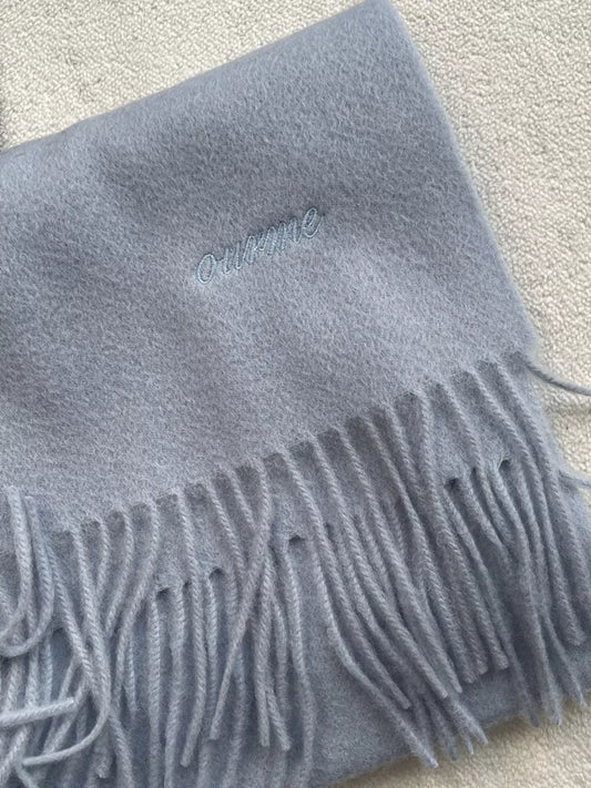 Unisex Azure Wool Fringe Scarf — folded blue scarf showing fine matching fringe