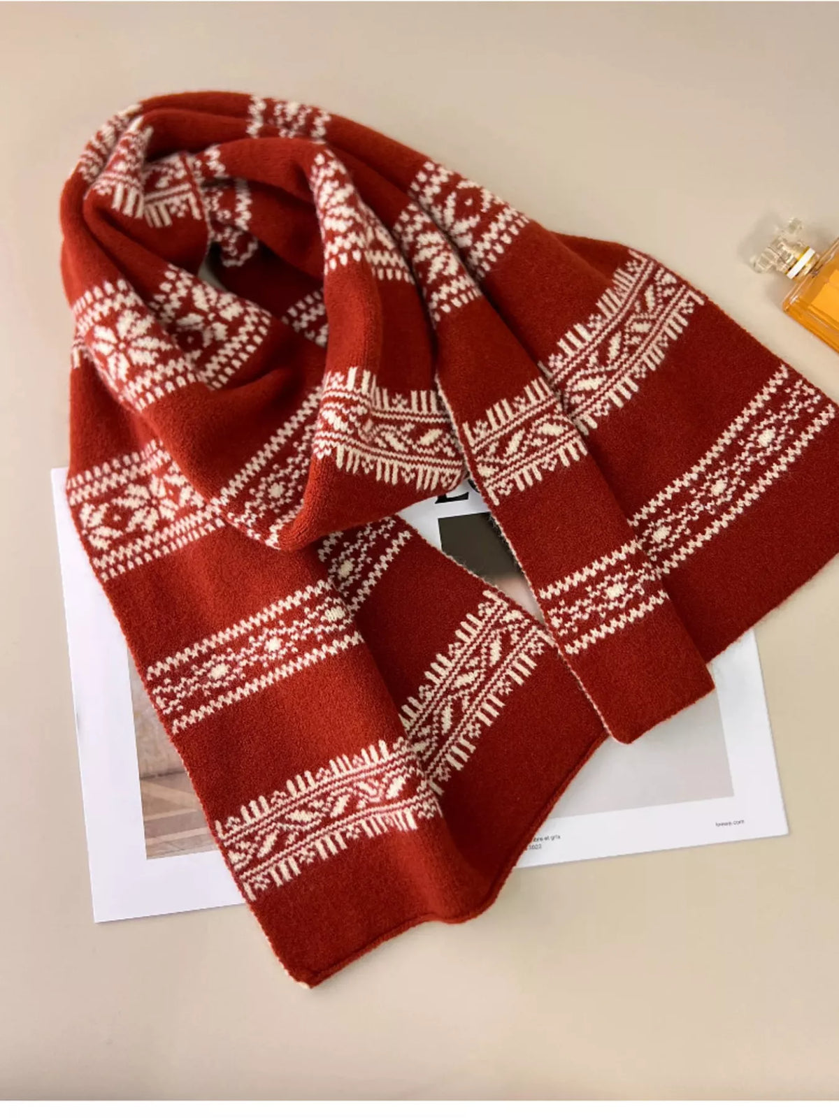 Unisex Winter Snowflake Pattern Knitted Scarf — rust red snowflake scarf arranged in a loop