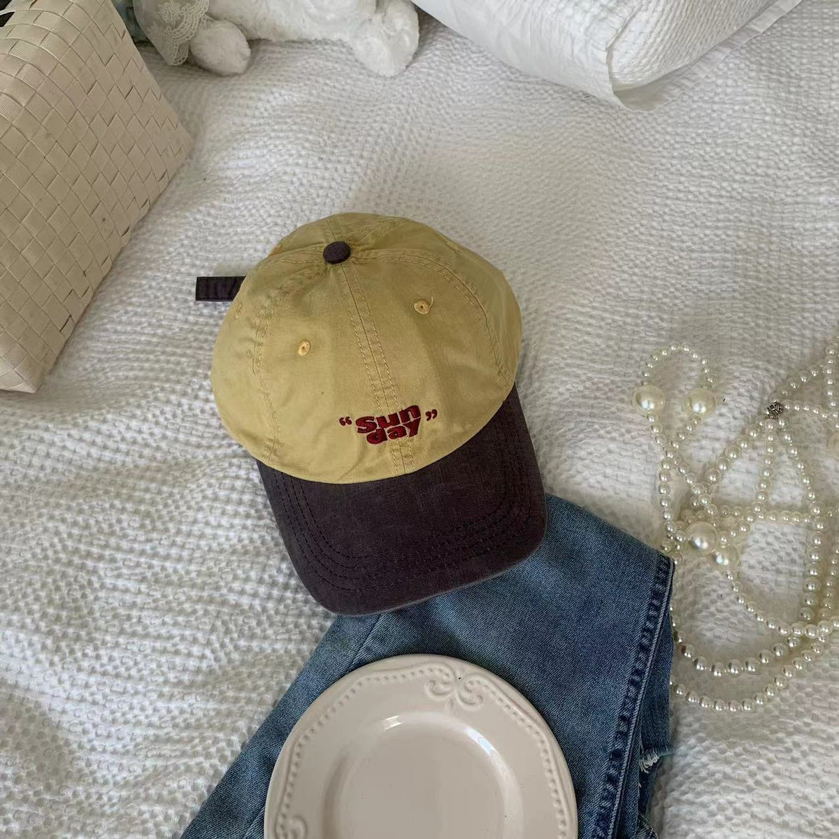 Yellow baseball cap with a dark contrast brim