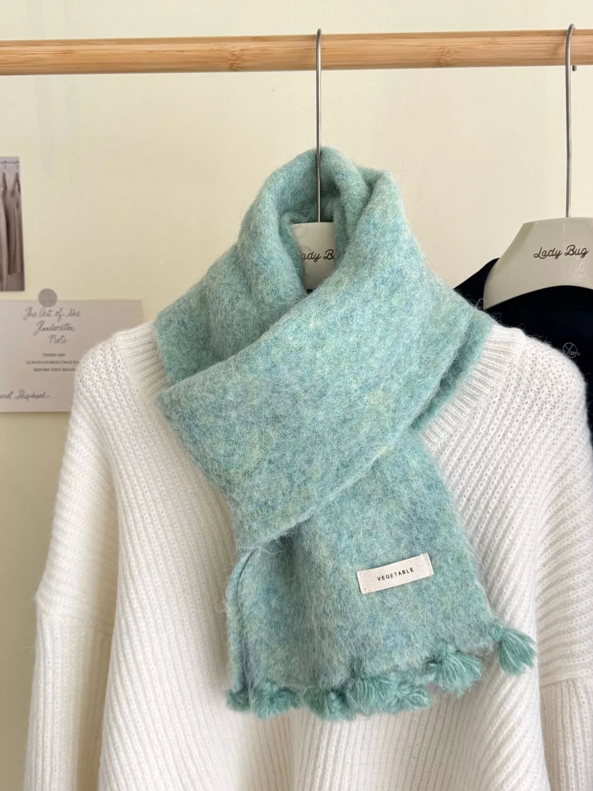 Unisex Tassel Knitted Scarf — green scarf with short fringe on light knitwear