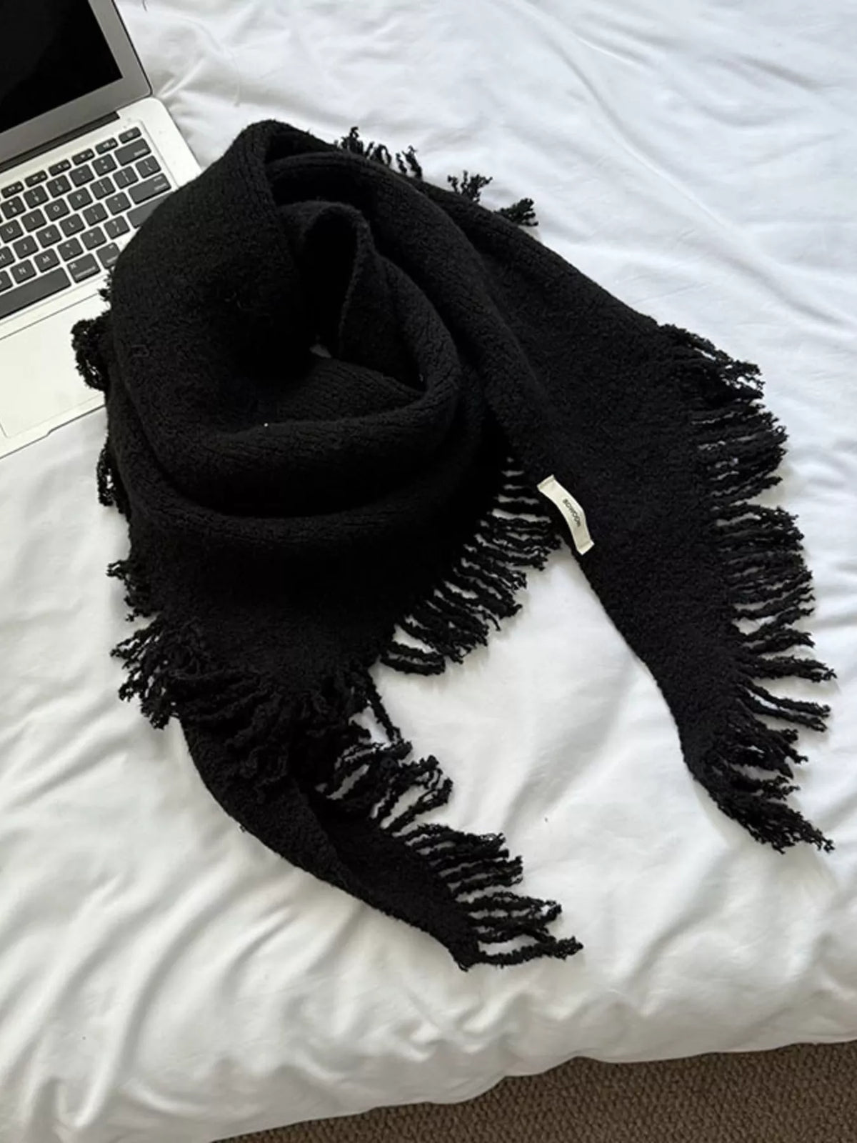 Women's Fringe Knit Triangle Wrap — black knitted wrap arranged with fine fringe visible