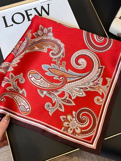 Unisex Vintage Paisley Silk Scarf — folded red scarf showing floral scroll pattern