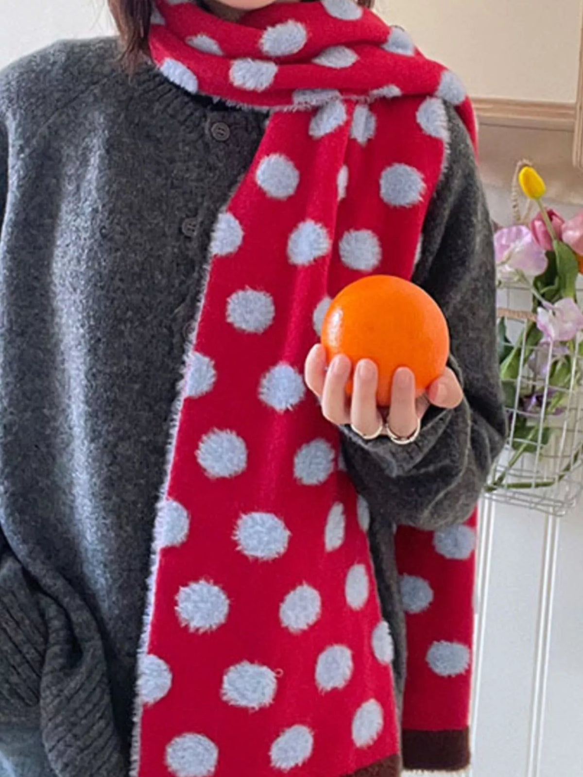 Unisex Blue Polka Dot Scarf — red dotted section worn long with a gray coat