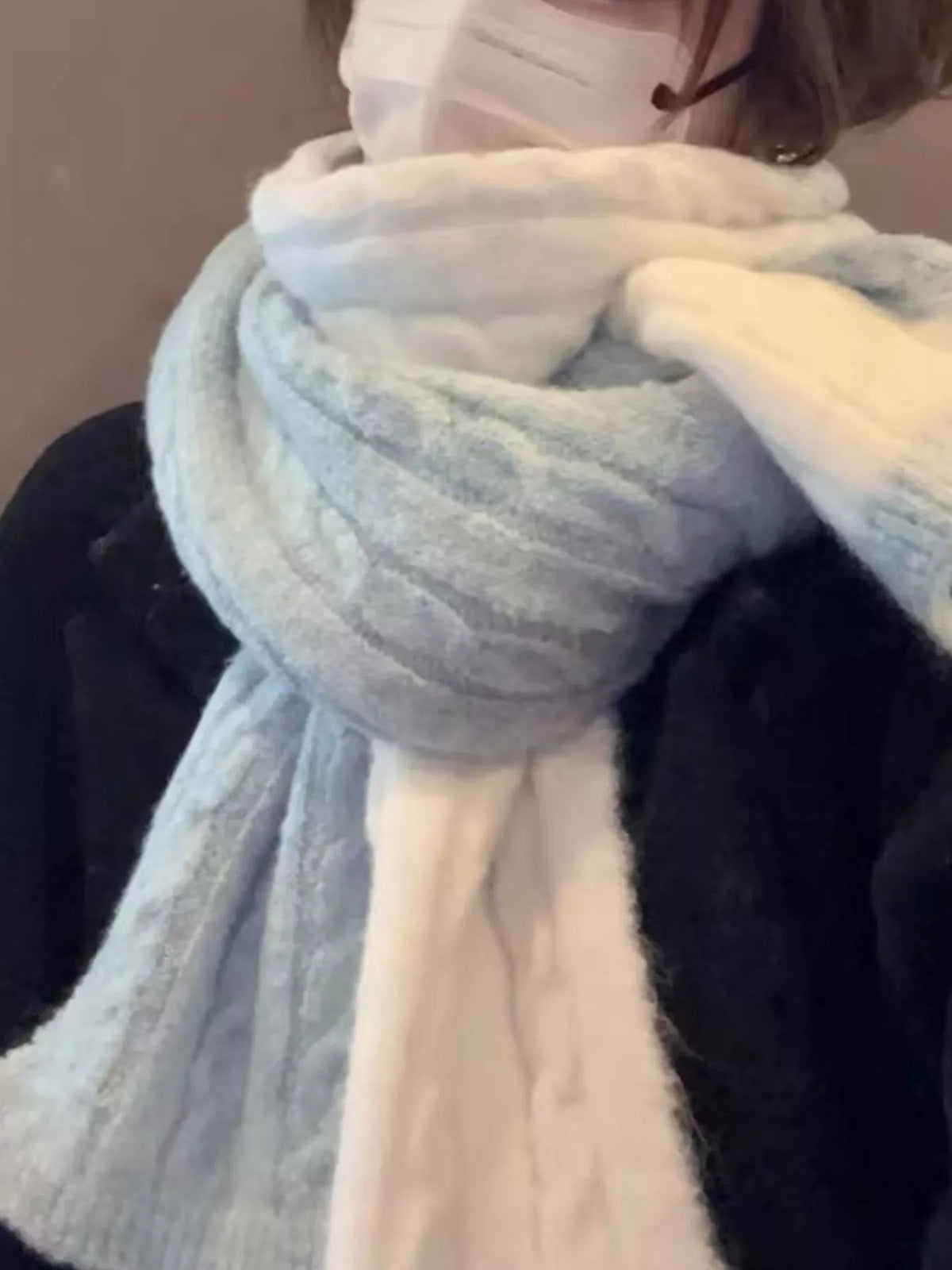Unisex Two Tone Cable Knit Warm Scarf — two-tone pale scarf wrapped over a dark coat