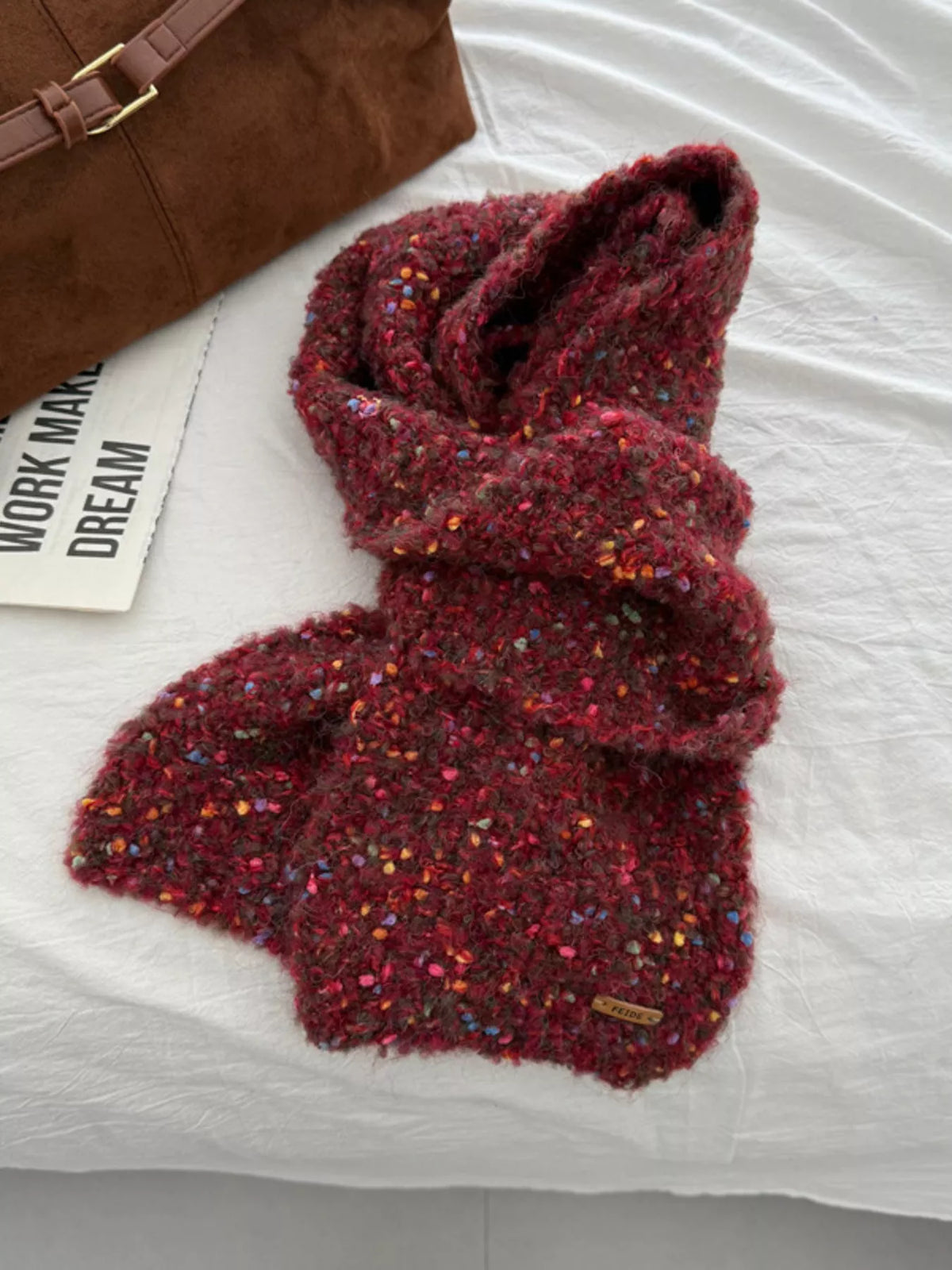 Unisex Multicolor Speckled Knit Scarf — burgundy scarf loosely tied with multicolor flecks visible