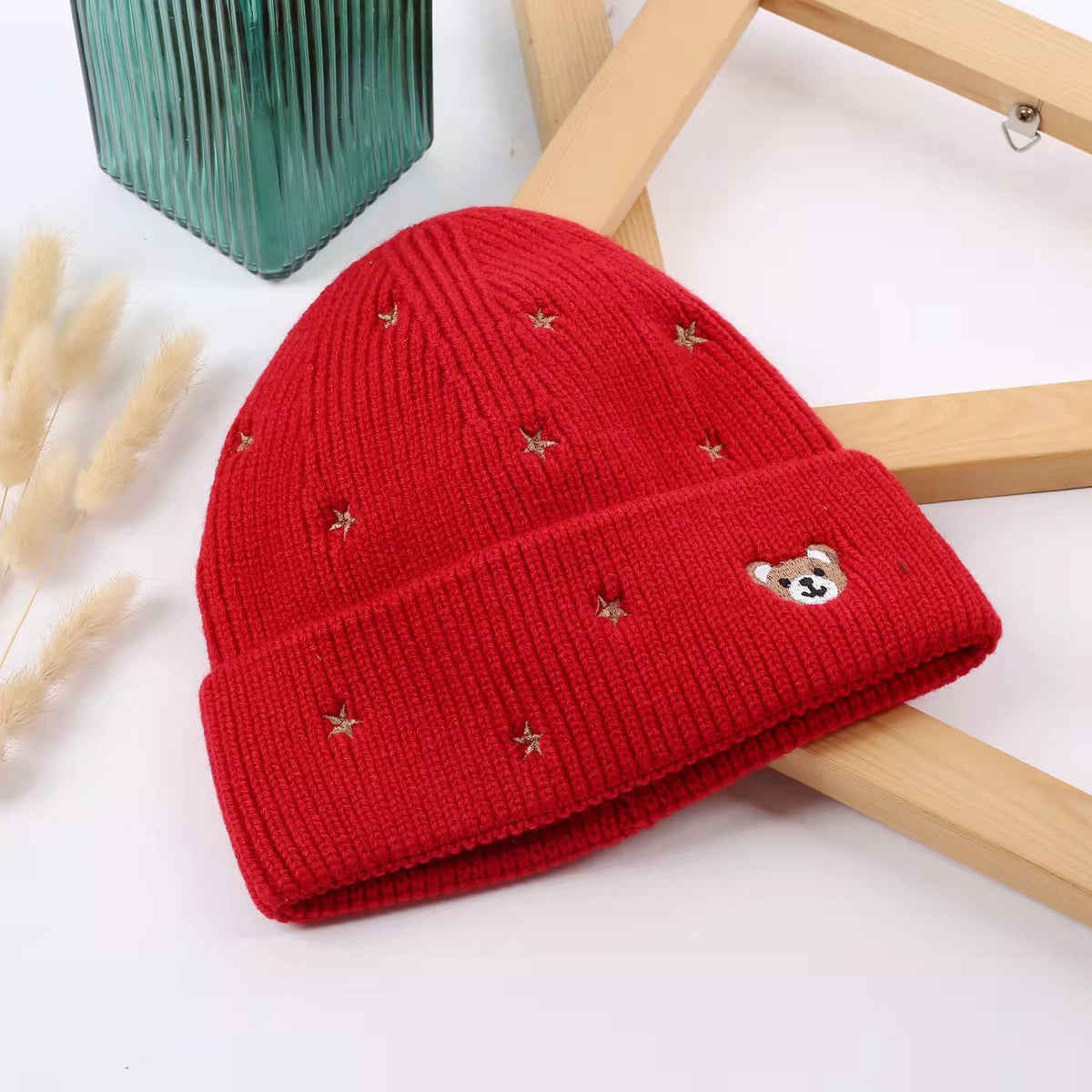 Red teddy bear cuffed beanie with scattered stars