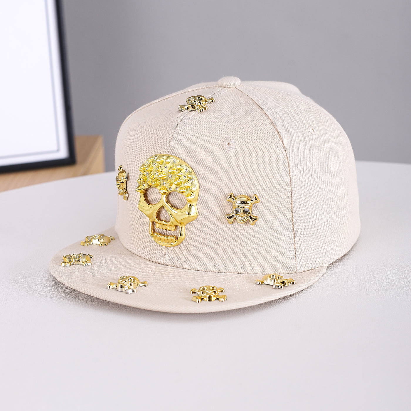 Unisex Beige Gold Skull Embellished Snapback Cap front view