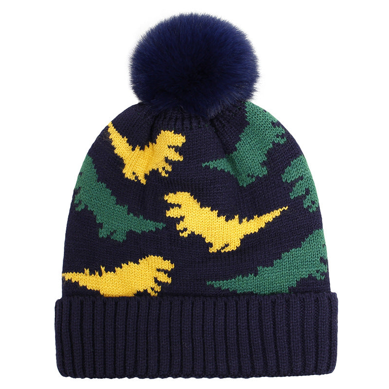 Dark kids pom pom beanie with green and yellow jacquard dinosaurs